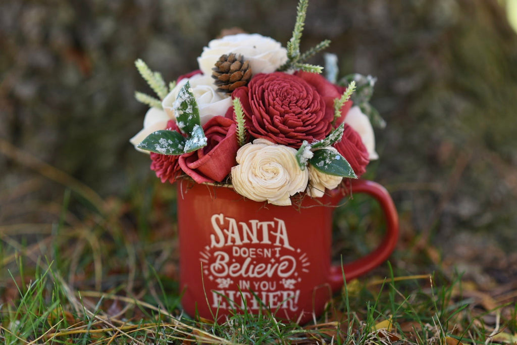 “Santa doesn’t believe in you either” Mug